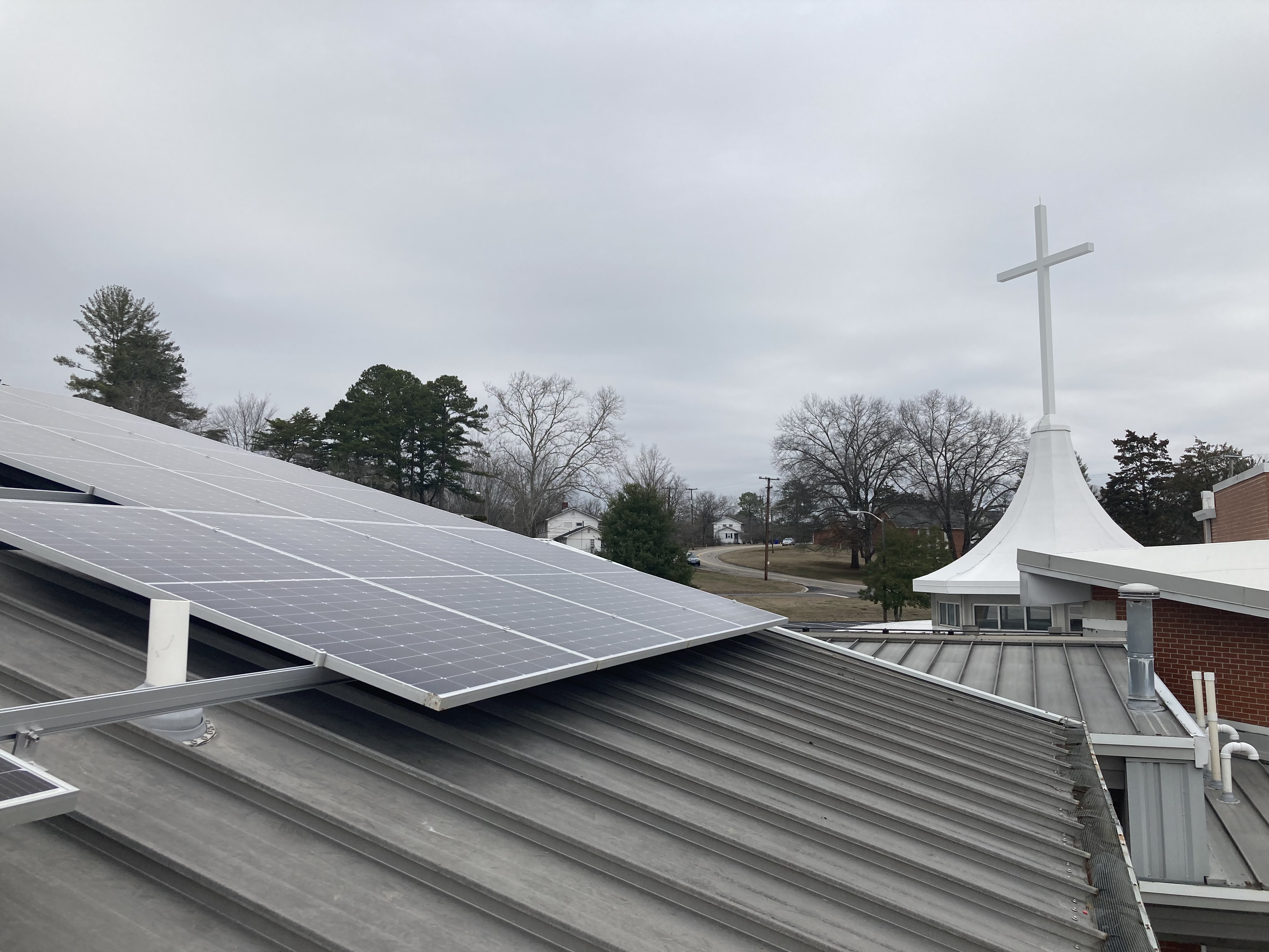 Solar panels are easy to attach without roof penetration to properly prepared metal roof with standing seams.